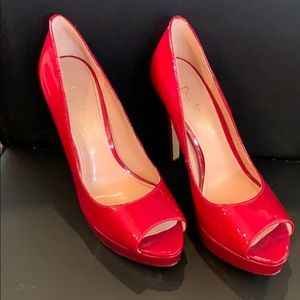 Red platform peep toe heels